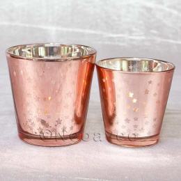 Kerzengl&auml;ser f&uuml;r jeden Anlass in gl&auml;nzendem Ros&eacute;ton mit Sternen, die durch eine Teelicht zum strahlen gebracht werden. F&uuml;r Teelicht und Maxi Teelicht.