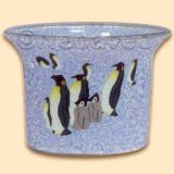 Leuchtglas Teelichtglas 5cm K�nigspinguin Familie auf winterlichem Untergrund.